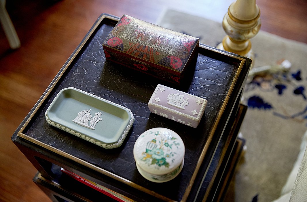 “We love having those little moments,” says Jason of the collections displayed throughout the house. “Every little piece that we have is a story from our travels or something that we inherited from our family, and those memories and traditions bring those collections to life.”
