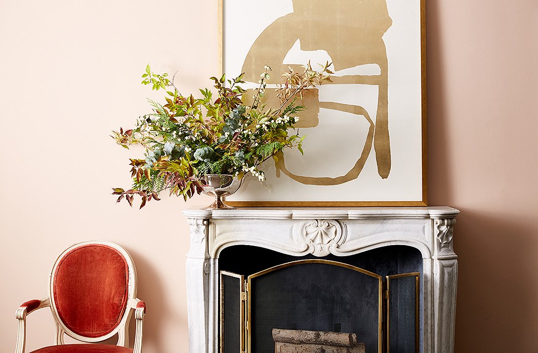 Eucalyptus adds height, cedar adds volume, and forsythia and snowberry add color and texture to this bowl vase’s rule-breaking arrangement. Photo by Frank Tribble.
