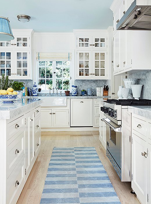 Shades of blue and white make for a cheerful, crisp kitchen. “I love blue-and-white dhurries,” Mark says.
