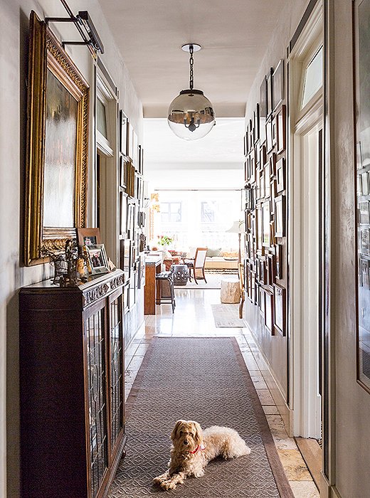 An antique Dutch oil painting from Katie’s childhood home rounds out the hallway, a magnet for guests and visitors (and the family pooch, Noodles). “People love hanging out there—it’s like a little magic zone. It’s a trip down memory lane in the best possible way.”
