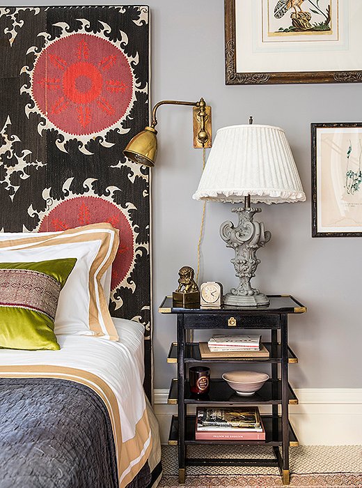 Unafraid of going big with pattern in a small space, Katie covered her headboard in a large-scale suzani print. “I find that by giving more definition to spaces through color and pattern you can make something feel a lot bigger than it actually is.”
