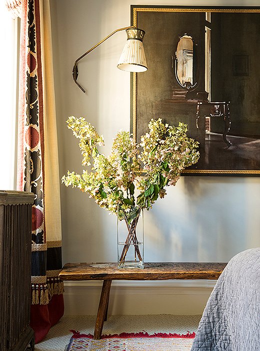 The curtain border comes from the same vintage textile used on the headboard. “It’s a fun way to make use of every scrap that you can when you’re cutting up those old textiles,” Katie says.
