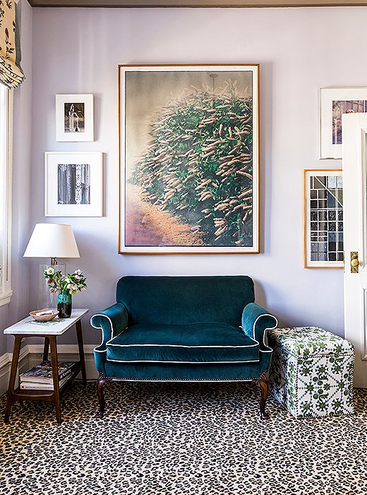 The velvet-upholstered settee has been with Katie since her 20s and now finds a home in her daughter’s room. “It’s been recovered a million times, and this is its latest incarnation,” she says. Leopard-print carpet adds an unexpected touch of glamour.
