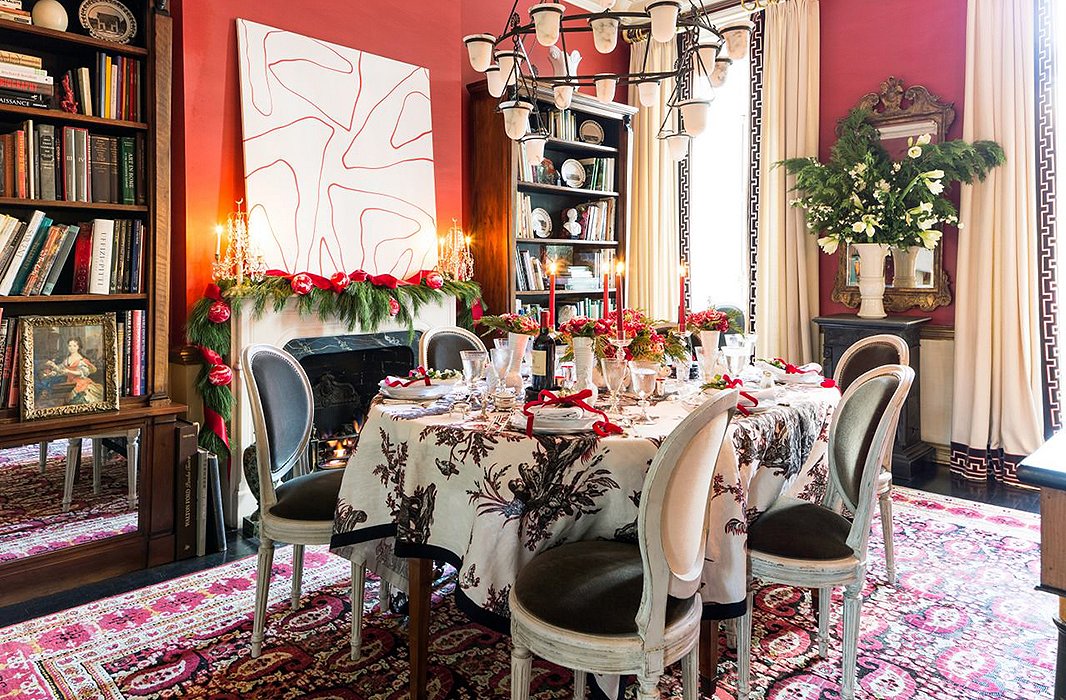 Classic and playful are the two guiding themes behind this tablescape, which is made fresh and festive with vintage silver, quirky details, and gorgeous greenery. Photo by Lesley Unruh. 
