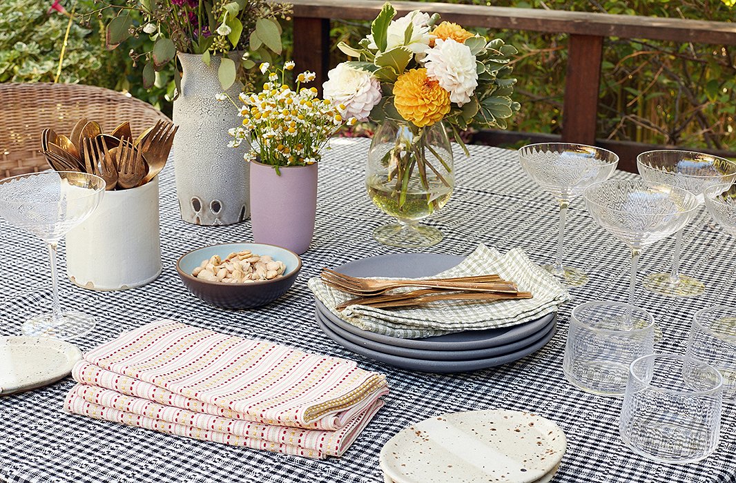 “I always have my eye out for new special things that I can add to the table,” Heather says. “I start with linens and put them with whatever is exciting me at the moment.”
