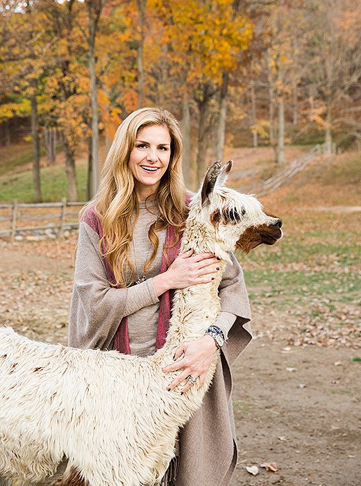 Alicia with one of the alpacas on her family’s 80-acre farm. “Life on an alpaca farm is pretty much like life on every farm.” she says.
