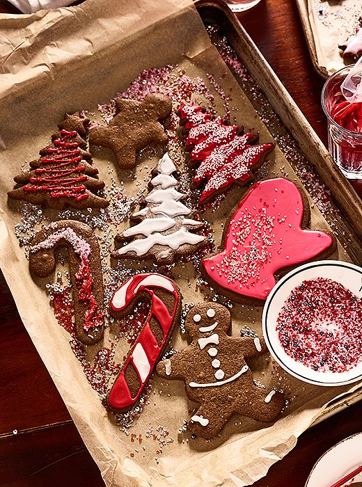 Red and white icing makes a classic topper for gingerbread cookies—with plenty of sprinkles, of course. The girls were “all over it.”
