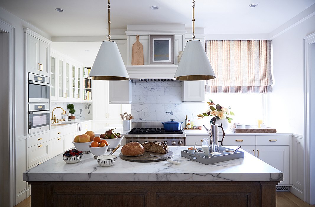 The kitchen island was a must-have for the wife, who once worked in one of New York’s best restaurants. “Maneuvering things in the kitchen to make sure she was able to get that was fun and interesting,” says Vivian.
