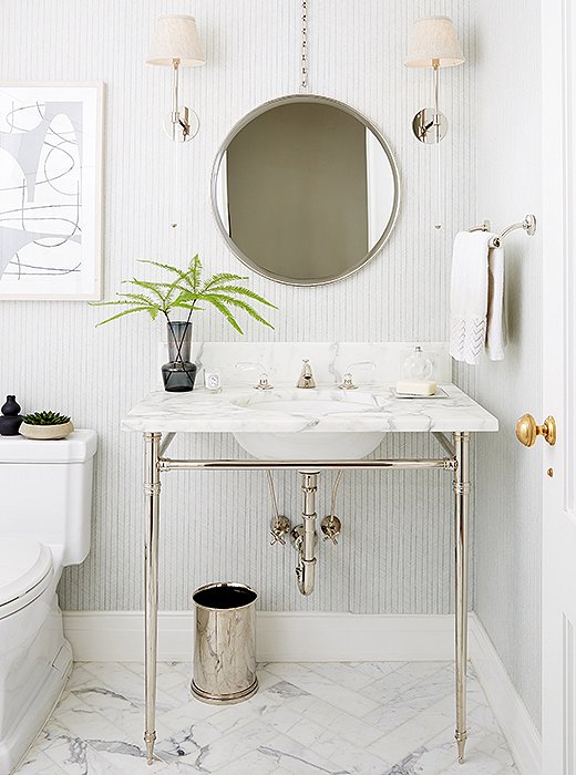 In a New York City apartment designed by Alyssa Kapito and Vivian Muller, a pale-gray stripe gives the walls a subtle hint of interest. Photo by Manuel Rodriguez.
