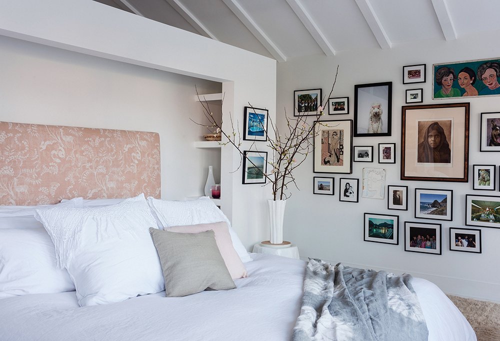 The linen bedding is from Matteo, and the headboard is upholstered with a Lisa Fine fabric. “I loved finding a nude fabric with deer and rabbits jumping across it,” Irene says. “I think nude is such a sexy, sweet, beautiful color.”
