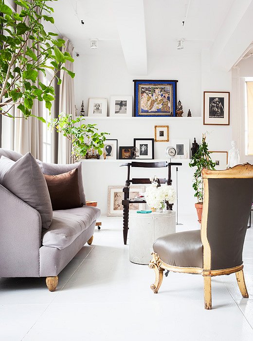 This New York loft is a study in open-plan living with pure white walls and floors. Room by Vicente Wolf; photo by Lesley Unruh.
