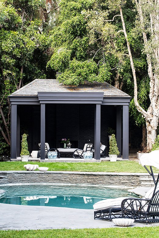 This backyard’s gazebo provides loungers a break from the summer sun. Photo by Nicole LaMotte.
