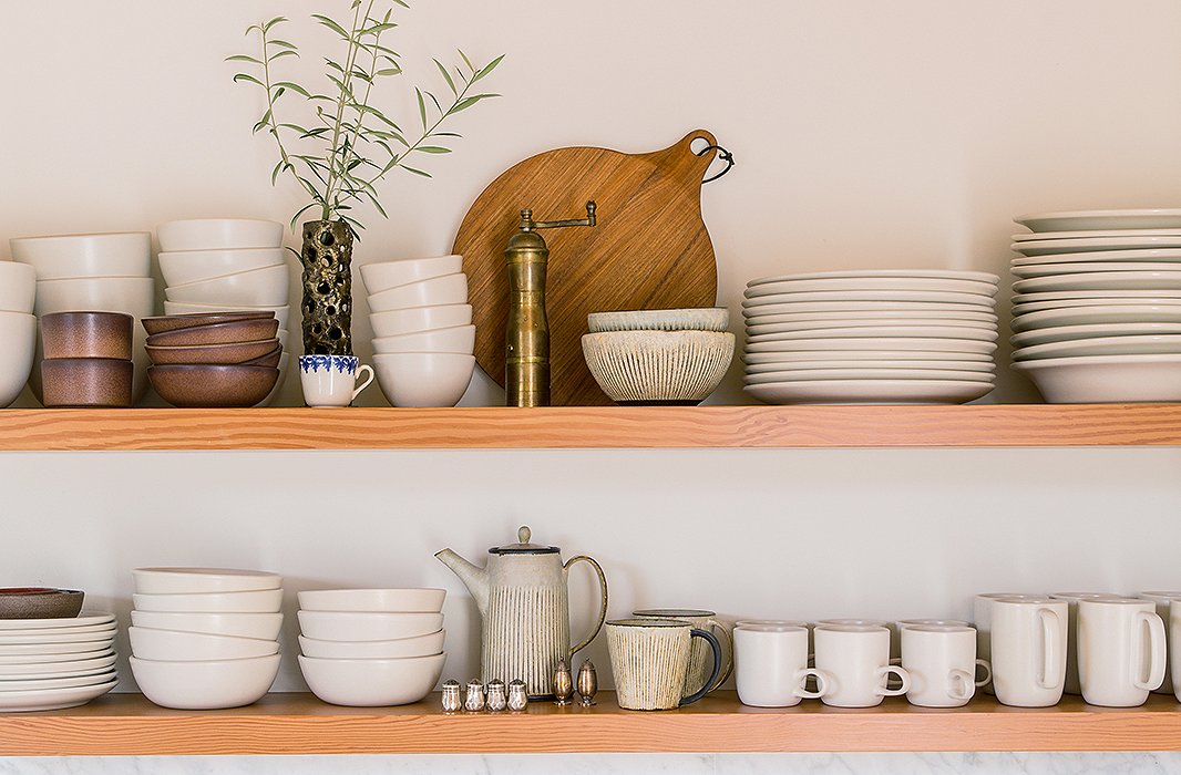 An admitted ceramics-lover, Jessica uses the kitchen’s open shelving to display an alluring array. “Most are from Heath and Akio, but it’s good to mix up tones and textures,” she says. “There’s some vintage there too.” Her other kitchen essentials? “A Vitamix, a cast-iron pot, and Moon Juice overnight oats.”
