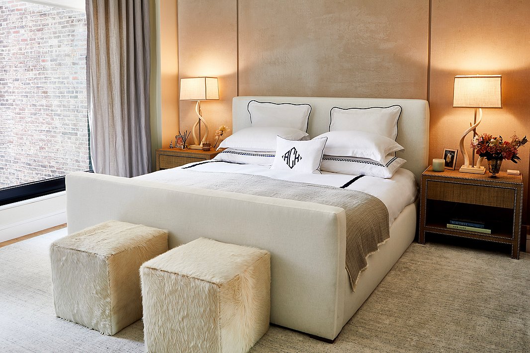 Manhattan apartments aren’t known for being spacious, but “having the ability to come together as a family for dinner or movie night in the living and dining areas but then be able to retreat to our own rooms makes the space feel much bigger,” Ashley says. Find the main bedroom’s linen-upholstered bed here.
