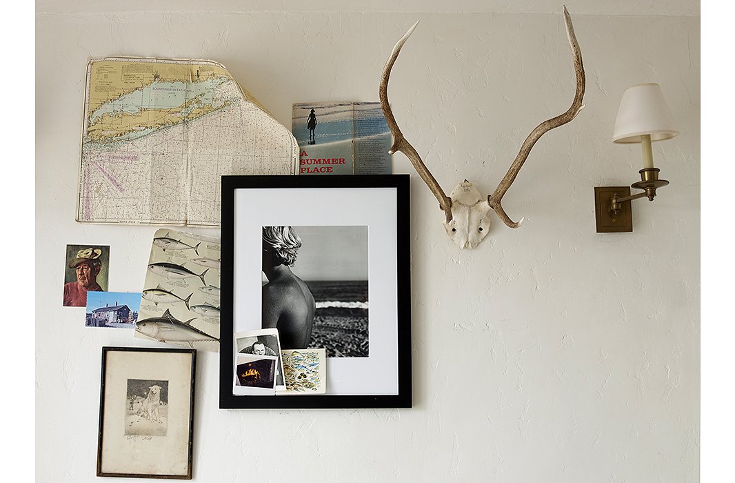 Tacked to perfection: A photograph by Matt is surrounded by a loose arrangement of unframed images and memorabilia. 

