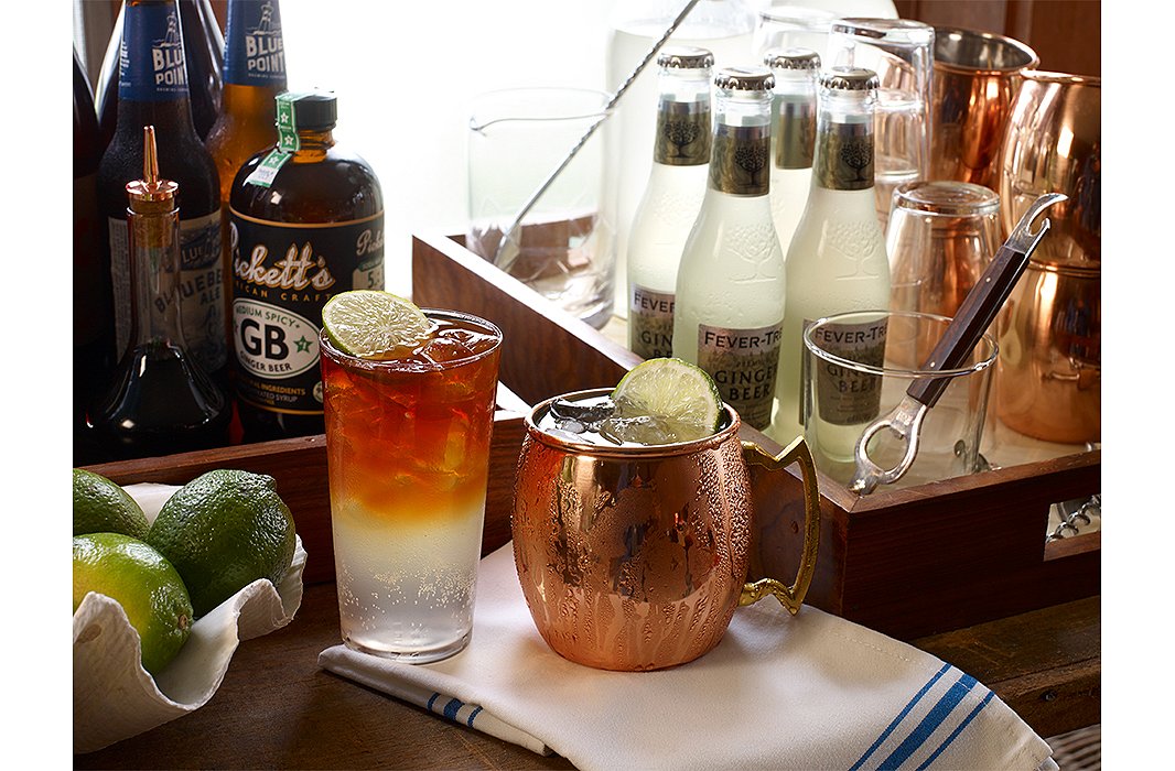 A Dark ‘n’ Stormy (left, Matt’s favorite) and a Moscow mule make festive predinner libations—and require many of the same key ingredients.
