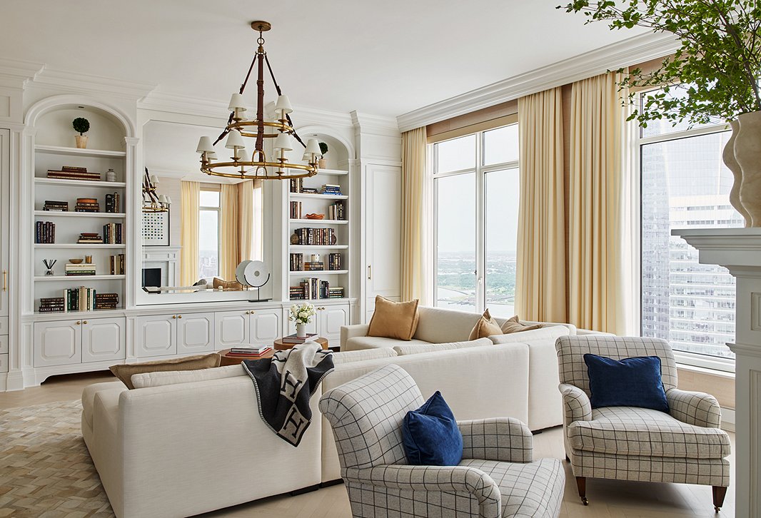 Even a few dashes of this blue—here, on the pillows—perks up a space. Photo by Seth Caplan; room designed by Ariel Okin.
