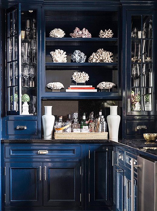 A shade of deep blue on the cabinets of The Zhush founder Sue De Chiara’s butler’s pantry transforms a pass-through space into a real showstopper. Photo by Lesley Unruh.
