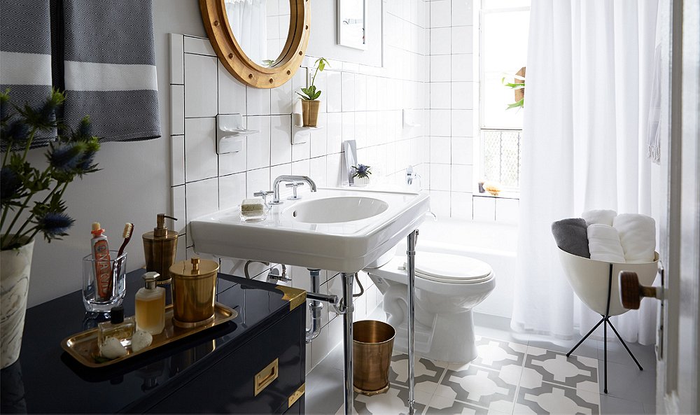 Sink area mini-makeover with brass towel bar under the sink