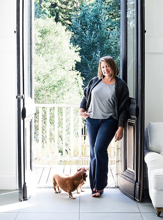 Artist Dawn Wolfe in her home studio. Take a tour of the light-filled space here.
