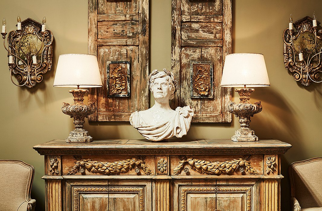 A handsome classical bust rests atop a carved-wood sideboard. Melissa is drawn to pieces with patina: layers of paint, faded gilding, timeworn textures.
