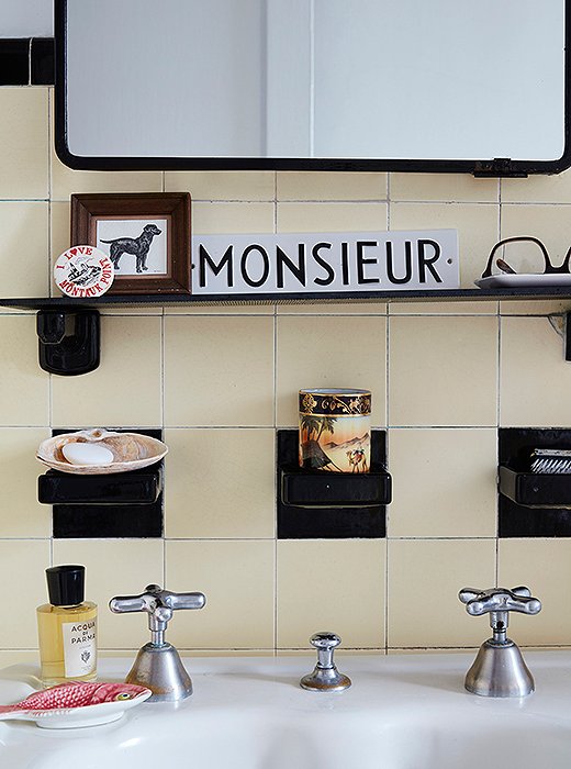 Personal touches in the master bath transform the sink into a charming vignette.
