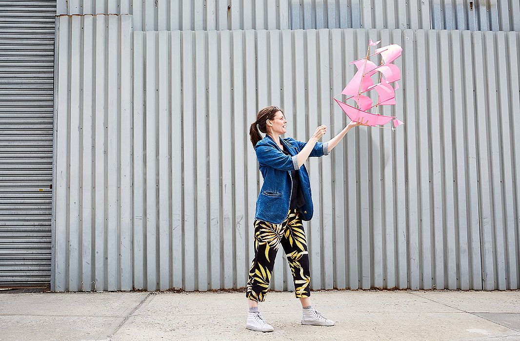 Emily prepares to send up the whimsical Sailing Ship kite, this version in a bright pink that will make an unexpected pop against the blue sky. 
