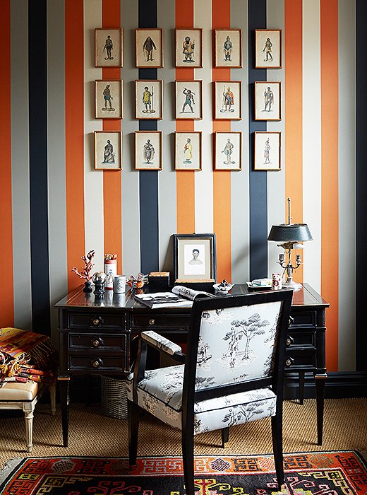 Sheila’s never met a stripe she didn’t like, and she used one of her own design for this wallpaper. The chair is upholstered in her Harlem Toile pattern, which is in the collection of New York’s Cooper Hewitt, Smithsonian Design Museum.
