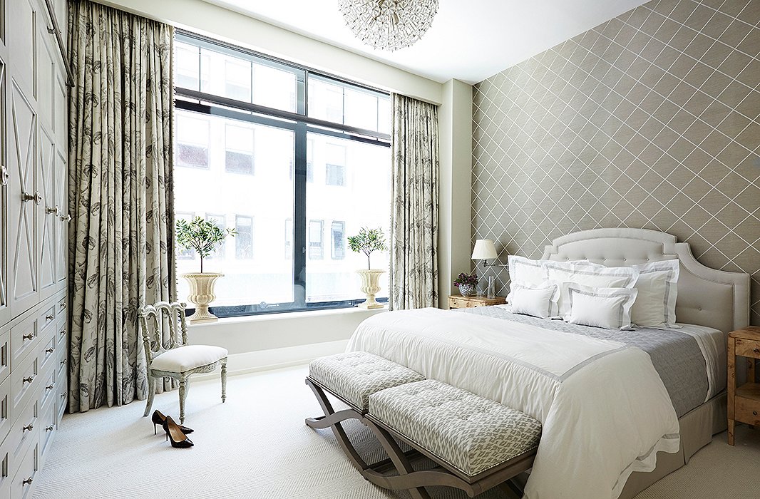 A soothing palette of neutrals turns the bedroom into a true retreat.
