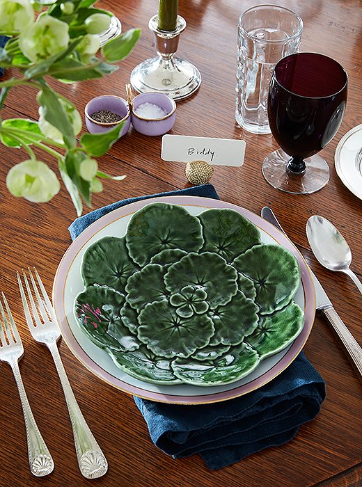 Place settings with Bordallo Pinheiro lettuceware, colorful glass, and silver utensils picked up in a Parisian market represent a mix that’s ideal for parties but casual enough for everyday. “My parents were always having people over,” Bobby says. “Whether it was dinner or cocktails, crawfish or steak, they had a knack for making things comfortable, not stuffy.”
