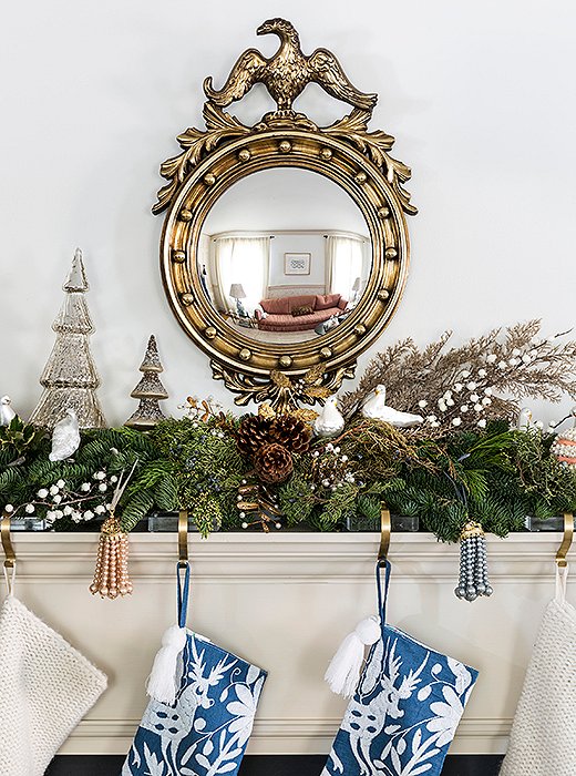 Stylish pearl tassels complement Otomi-inspired stockings on the family room mantel.
