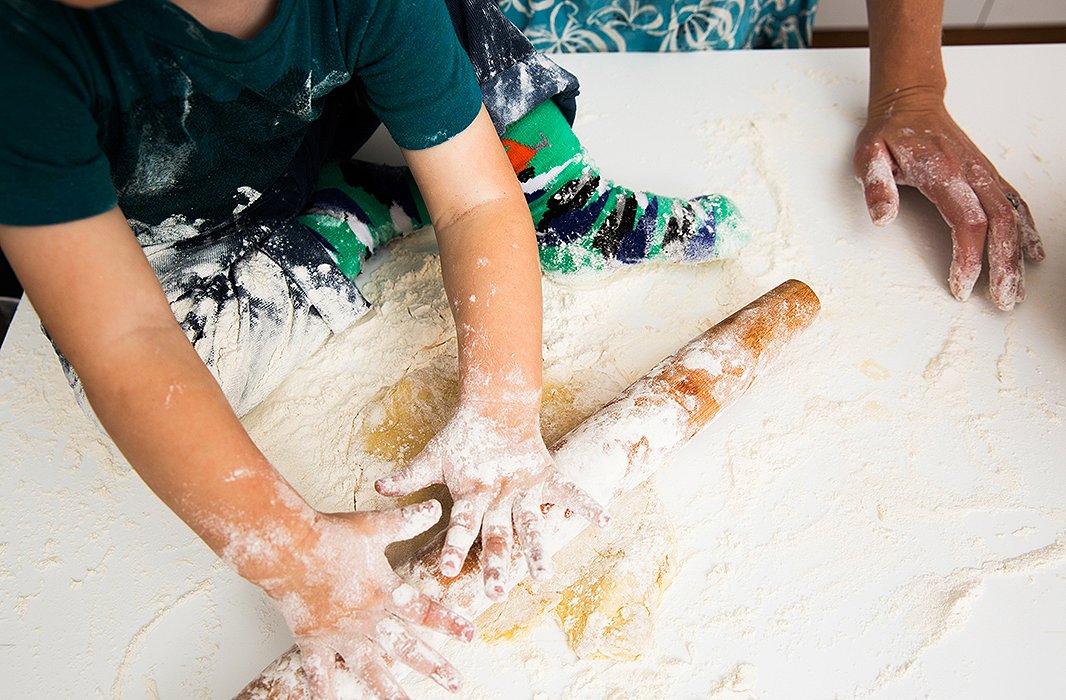 I used a leftover piece of crust to show Henry how to roll. He was all about showing the crust who’s boss, albeit with an ungodly amount of flour (not recommended).
