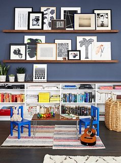 displaying picture frames on shelves