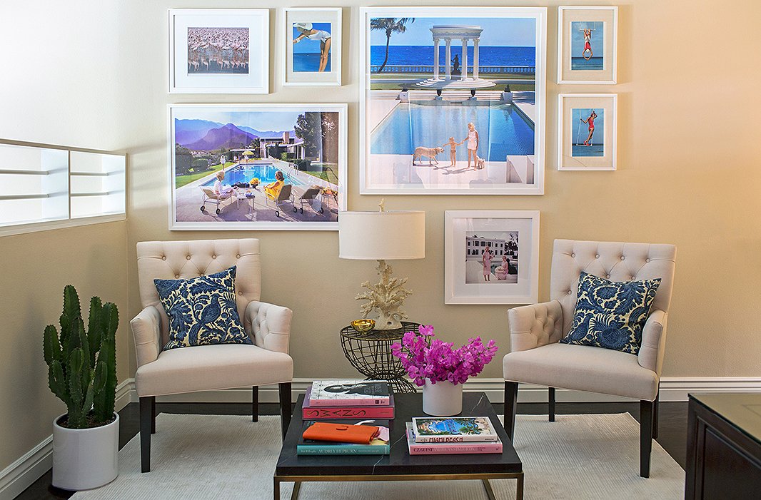 Louise carved out a comfy seating area that’s perfect for business meetings as well as for friends who often drop in during the day. (“My work life is very not a routine.”) Slim Aarons photographs, which Louise collects, were the jumping-off point for the office’s coastal theme.
