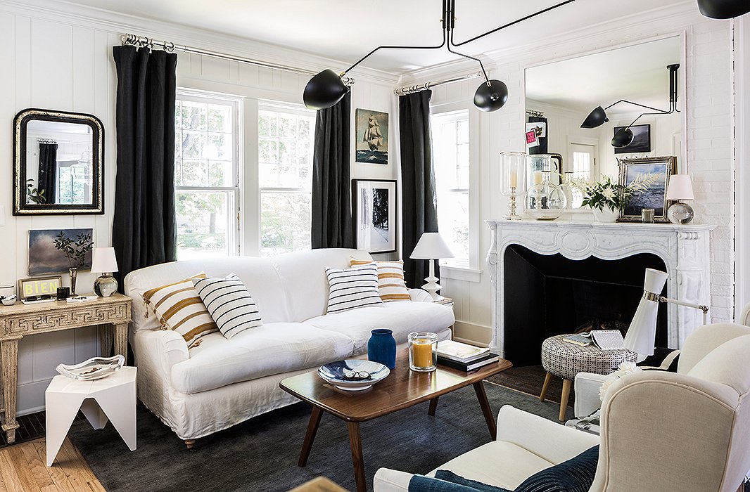 As this room shows, black and white plays just as well with organic textures as it does with sleek or graphic elements. Photo by Lesley Unruh.
