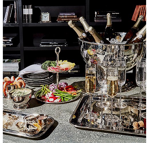 A New Year’s Eve-worthy spread, made all the more celebratory by the gleam of polished silver serveware.
