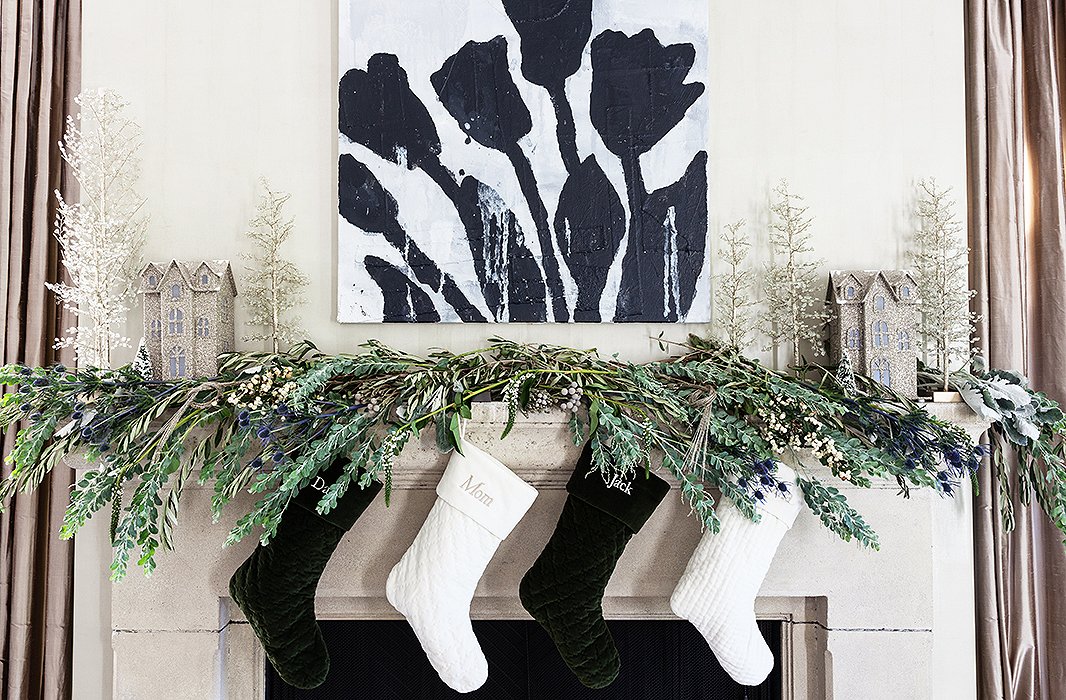 This mantel look is all about sparkle, shine, and high glamour, incorporating a mix of florals and greenery with a few special metallic accents.
