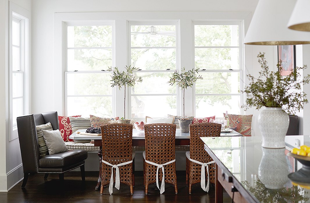 Dinners at the lake house are almost always casual, according to Barbara. “But we have had Thanksgiving dinner here, and we just squeeze everybody—which is, I don’t know, 14 people—in. Those big chairs at the end of the table are huge, so we put an adult and a grandkid in each of those to make it work.” For those rare formal occasions, the designer takes her tabletop game seriously: “I like to decorate. I like great china and great decor and flowers and everything at the table.”
