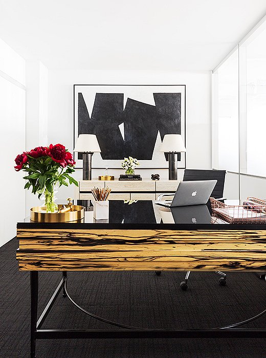 This desk is a particular favorite of Sally, Gabrielle, and Sophie. “It’s the first thing you see when you walk in. It really grounds the space and looks so chic,” Gabrielle says. “It’s totally unexpected for an office space,” Sally adds.
