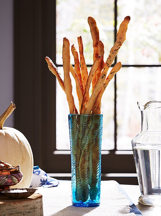 Light yet flavorful, rosemary Parmesan breadsticks make a perfect cocktail-hour nosh.
