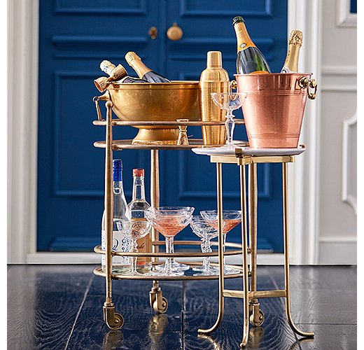 Find a similar bar cart here. 
