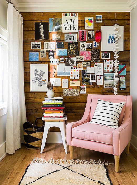 A simple slipper chair adds curves and contrast to a space filled with modern geometric lines. Photo by Lesley Unruh. 
