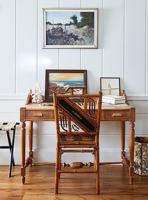 Painted seascapes nod to the hotel’s surroundings, while shell-covered accessories (note the sculptural wastebasket) add the perfect dose of nautical kitsch.
