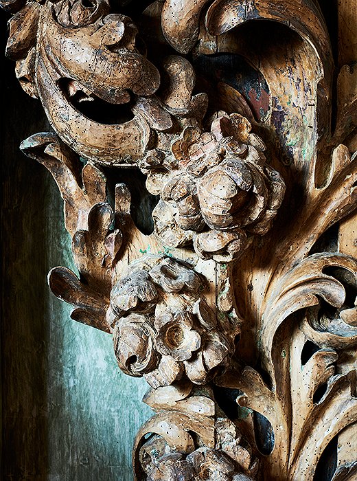 Though much of its original finish has faded, this carved-wood piece still shines with sculptural beauty.
