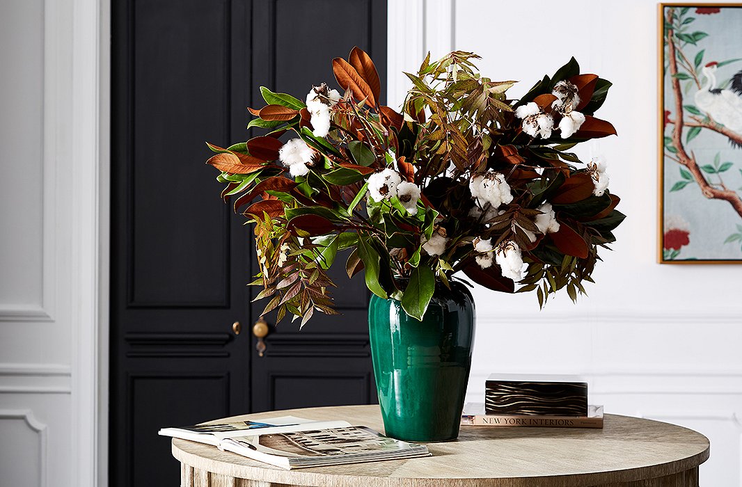 This vase’s classic ginger-jar silhouette and solid green color allow the bountiful arrangement of magnolia leaves to command attention. Photo by Frank Tribble.
