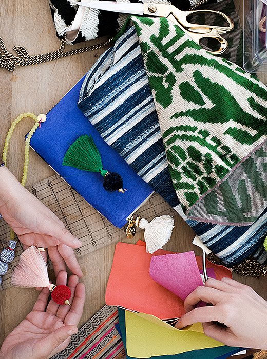 Gaia creations in the making. Colorful tassels, printed silks, and vibrant dyed leathers are turned into eye-catching earrings and playfully patterned pouches.
