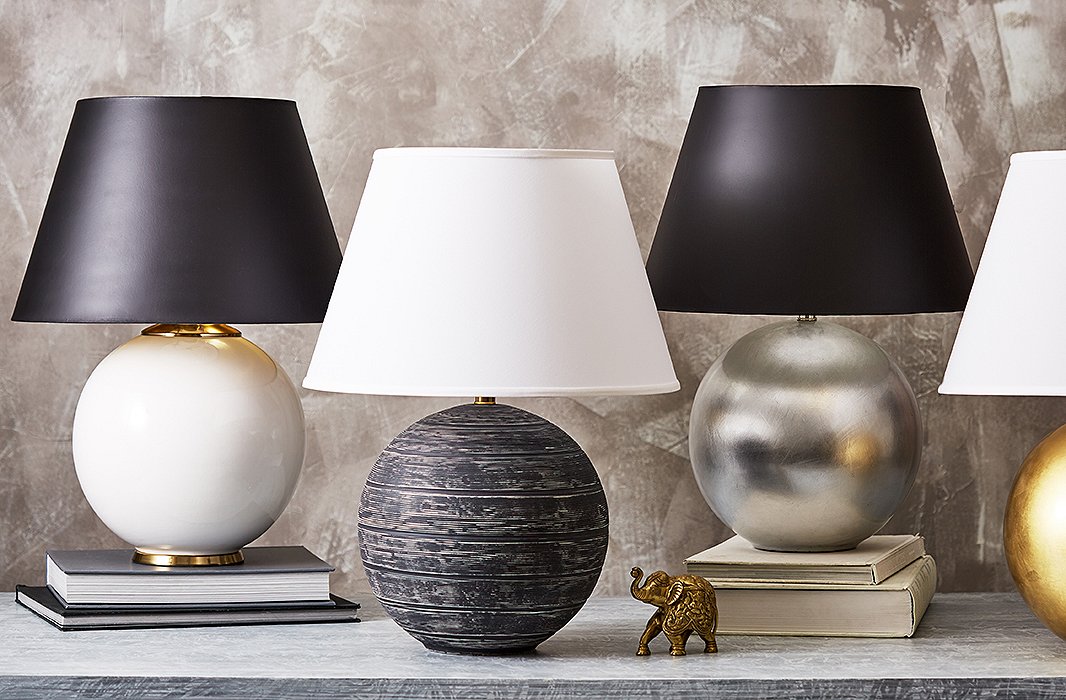 The spherical Pomona lamp complements both modern and traditional decor beautifully—and comes in a bevy of styles, including scaled-down versions in sets of two. 
