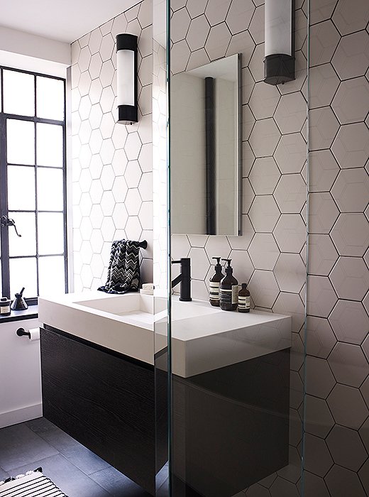  Hexagon tiles in the bathroom were difficult to install but give off a graphic effect that Suki and Morgan feel was well worth the challenge.
