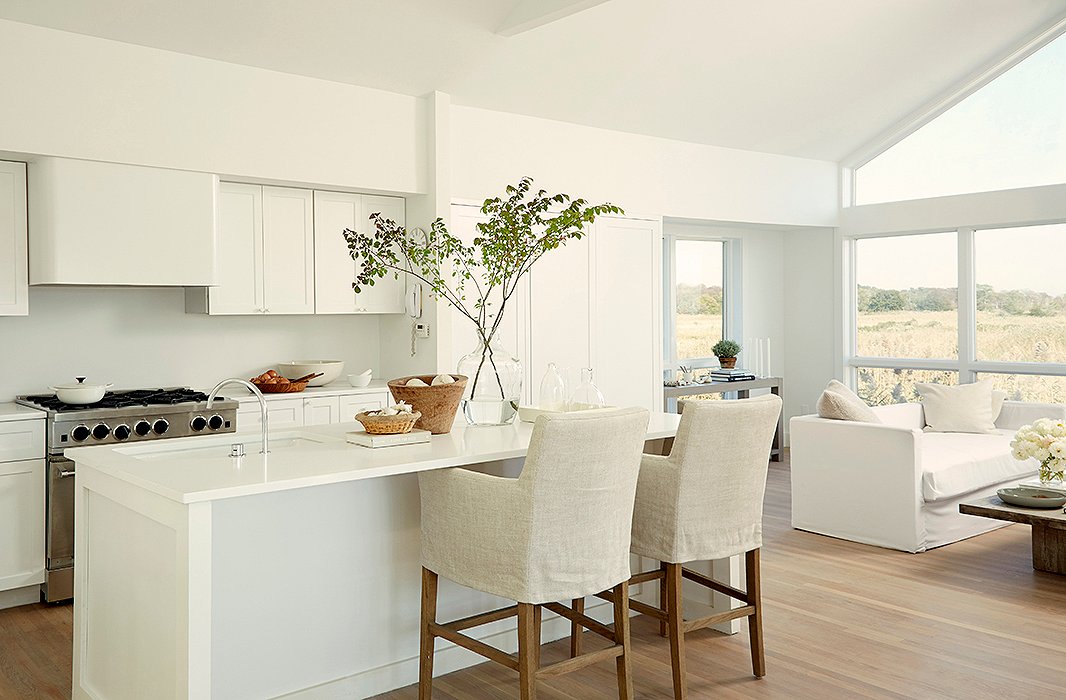 The kitchen’s many textures speak to one of Foley’s cardinal rules: Don’t do everything in the same finish. “Leave the walls matte, do a coat of semigloss on the cabinets, and enamel on the furniture,” she says.
