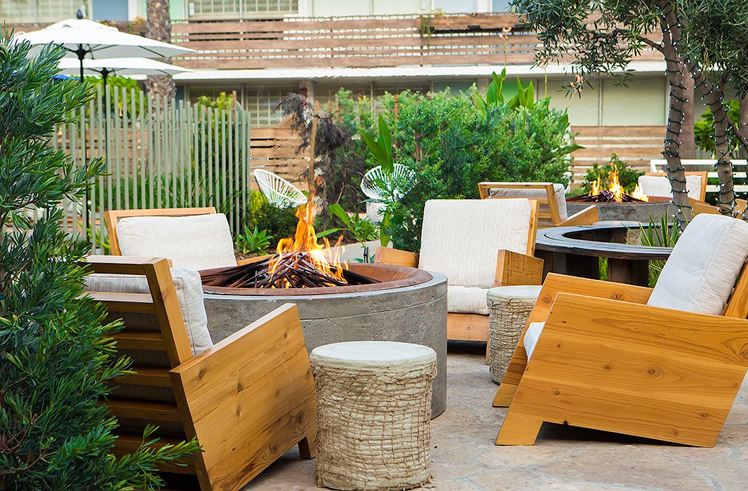 Guests can kick back by the fire pit with a cocktail—or a s’more. Photo courtesy of The Goodland.
